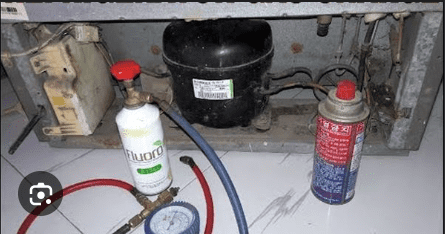 Single door refrigerator gas charging service technician filling refrigerant in fridge